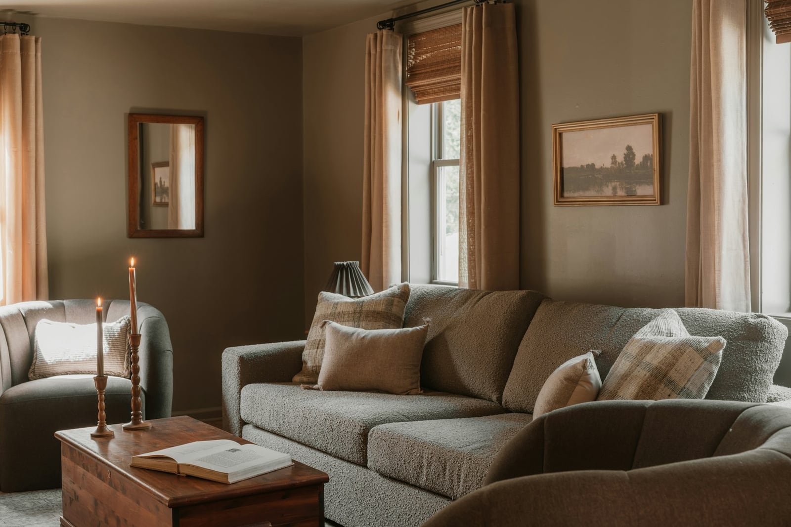 Upholstered sofa with custom cushions in a warm living room